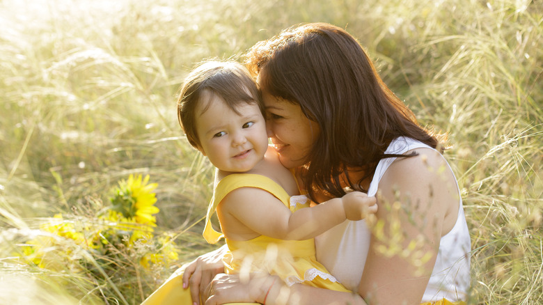 A mom and an older happy baby