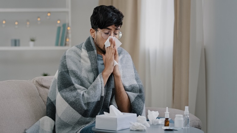 sick man with runny nose