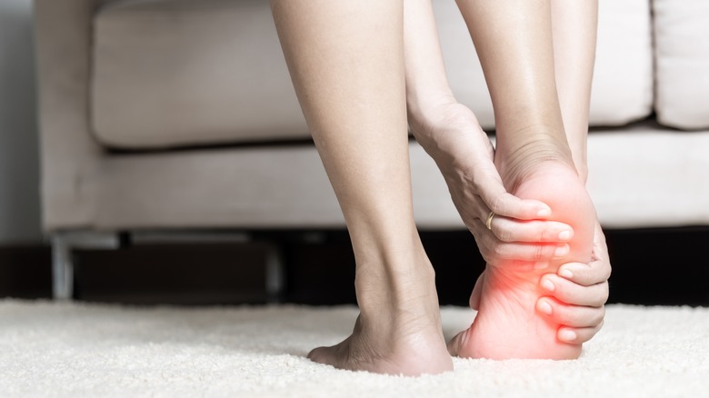 woman with foot pain