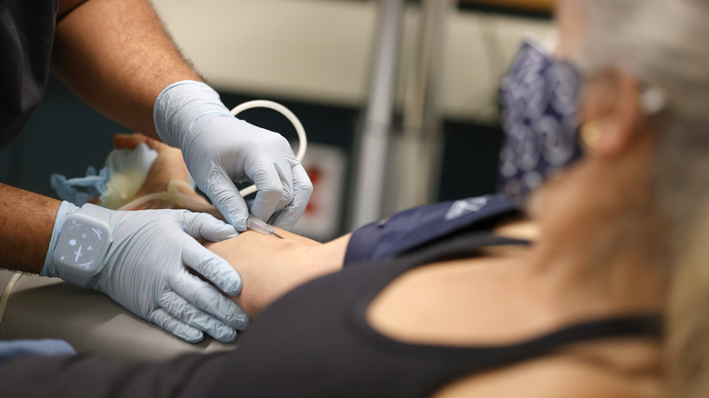 A woman donating blood