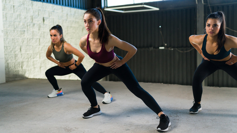 Group of women taking HIIT classes