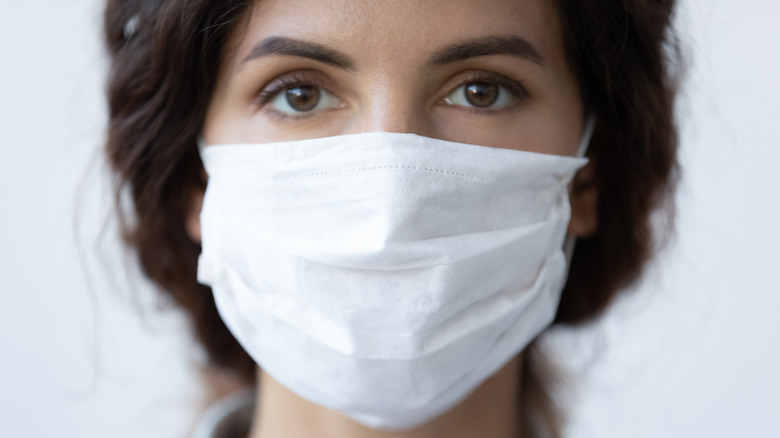 woman wearing surgical mask
