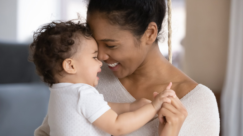 woman holding baby