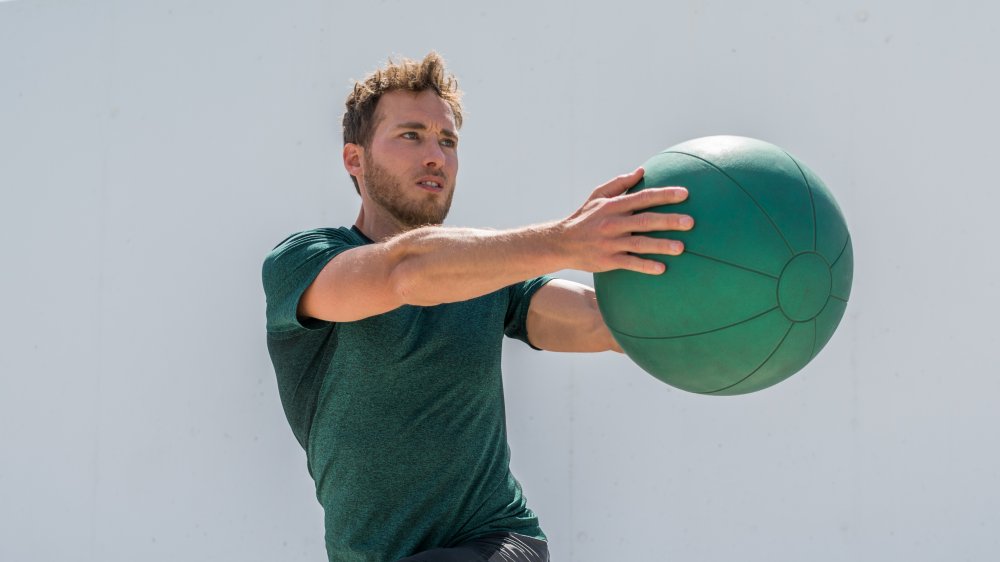 man with medicine ball