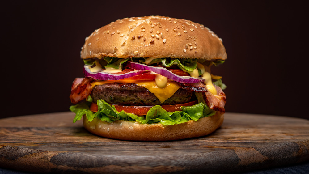 A burger on a wooden table