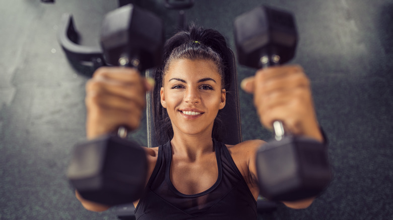 woman lifting weights