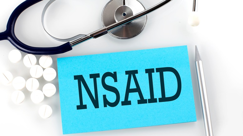 stethoscope with the word NSAID underneath it