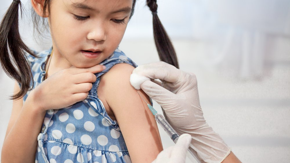 child getting vaccine