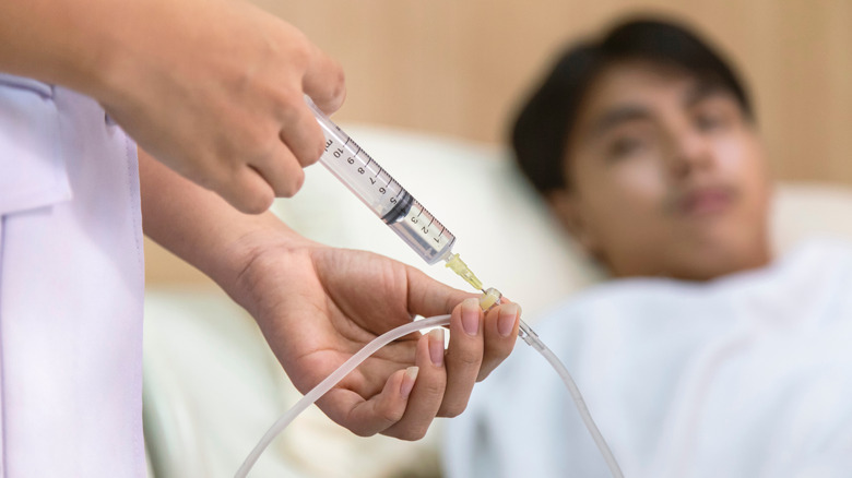 Patient receiving IV treatment