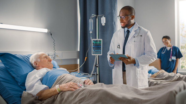 Patient lying in hospital bed