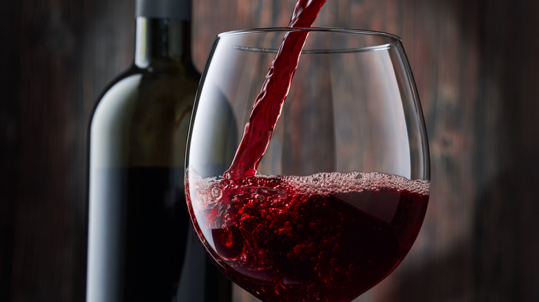 red wine poured into glass