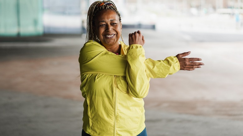 Woman stretching before exercise