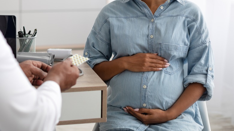 A pregnant woman at the doctor