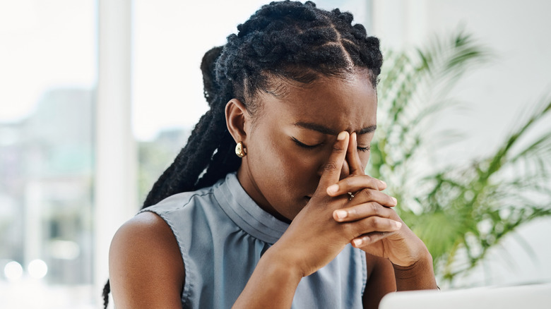 woman stressed out at work