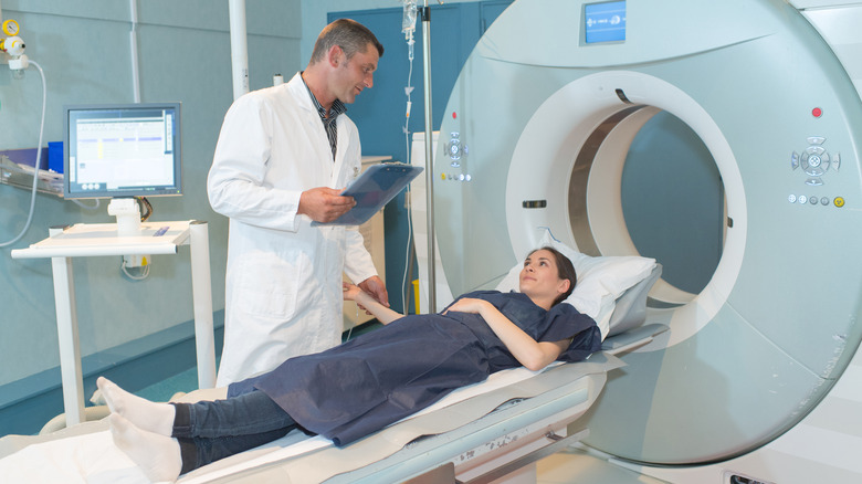 Woman entering an MRI machine