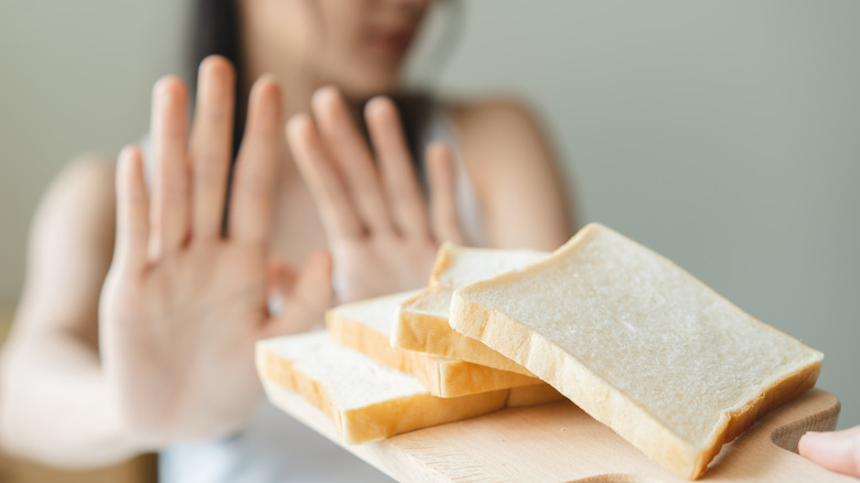Woman avoiding white bread