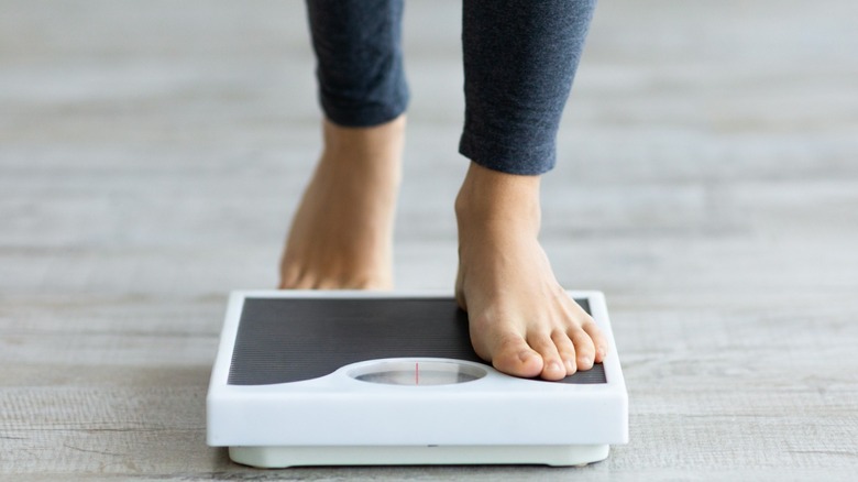 woman tracking weight loss