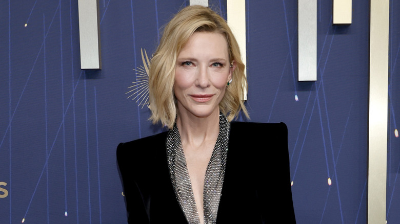 Cate Blanchett posing in a black outfit