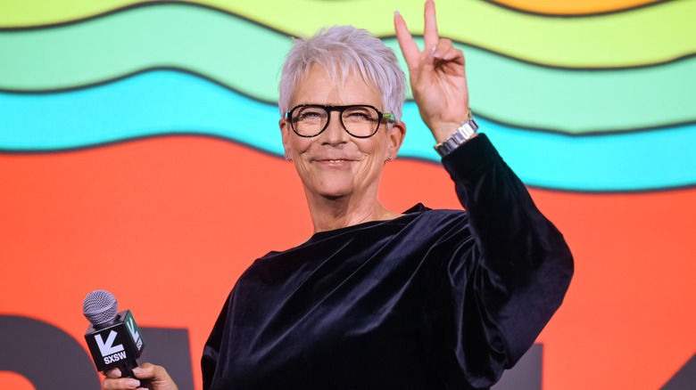 Jamie Lee Curtis giving a peace sign