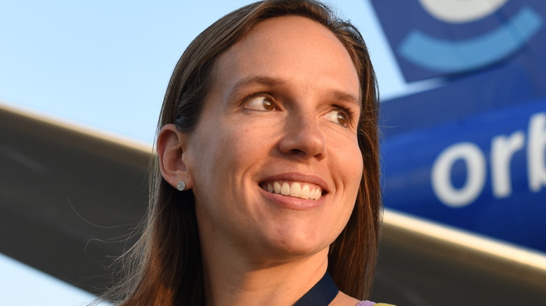 Dr. Annette Giangiacomo standing in front of the Orbis Flying Eye Hospital