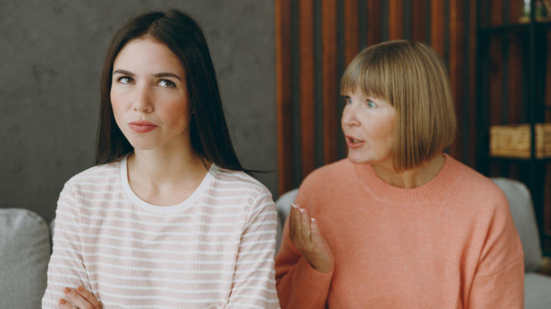 An older woman and a younger woman arguing