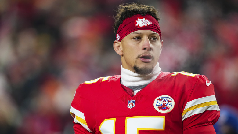 Patrick Mahomes in his red Chiefs gear, clouded by the steam from his mouth.