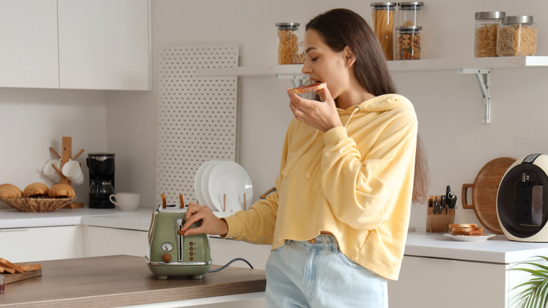 Woman eating peanut butter