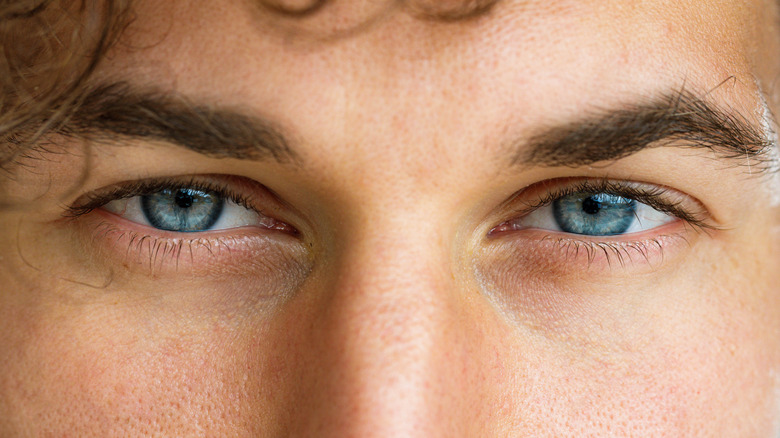 Close-up on man with blue eyes