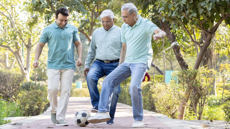 Three men in park