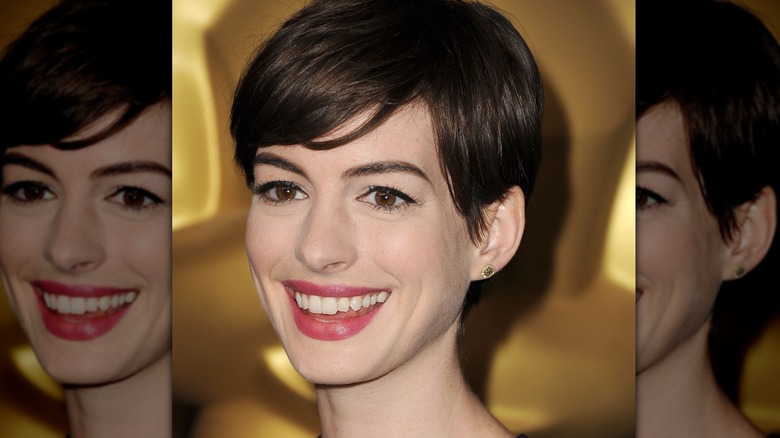 Anne Hathaway smiling in 2013