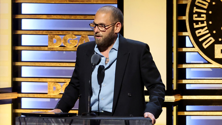 Jonah Hill giving a speech at an event after losing weight