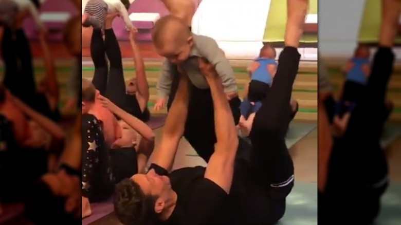 Ryan Seacrest doing Mommy and Me yoga