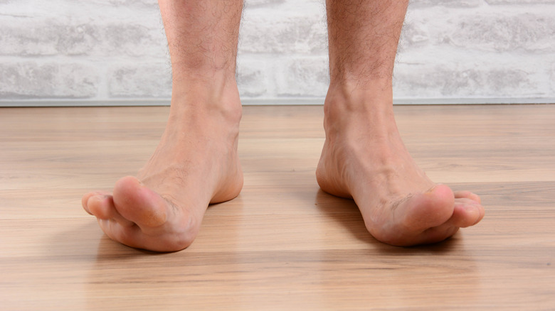 person with upturned toes