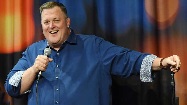 Billy Gardell talking into a microphone