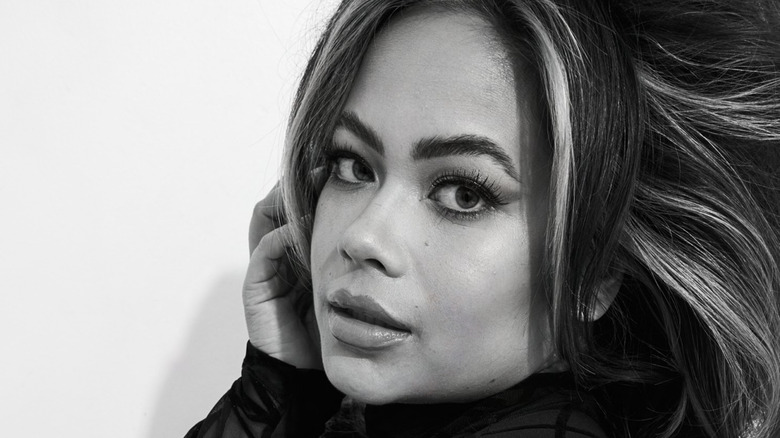 Catie Li posing in black and white