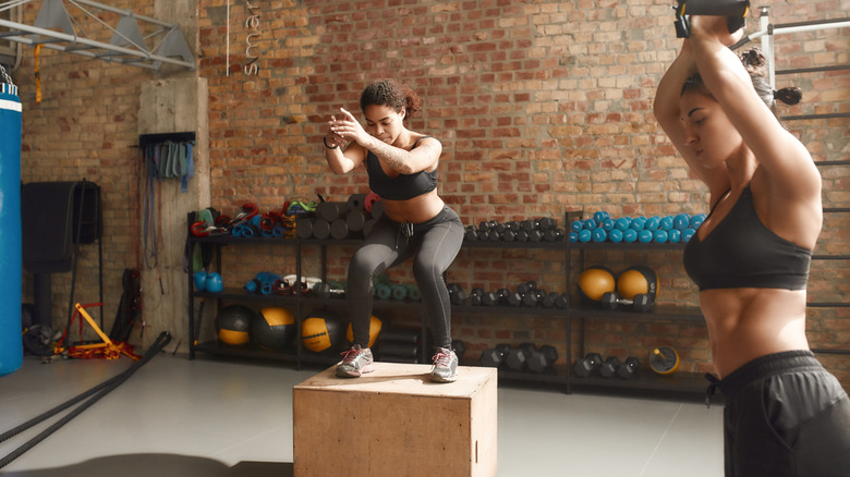 Women performing plyometrics