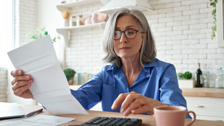 Woman looking at her debt