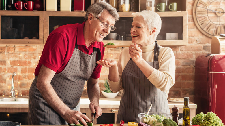 Senior couple cooking