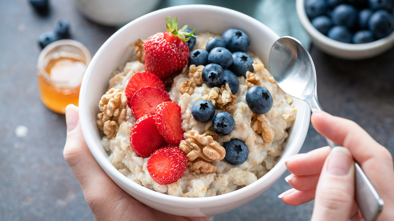 A bowl of oatmeal with a spoon