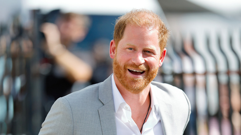 Prince Harry smiling outdoors