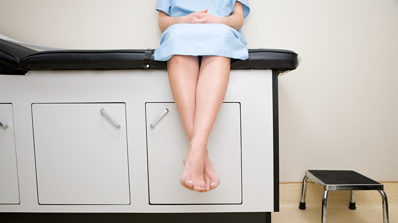 patient sitting at doctor's office