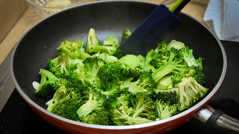 broccoli florets in a saute pan