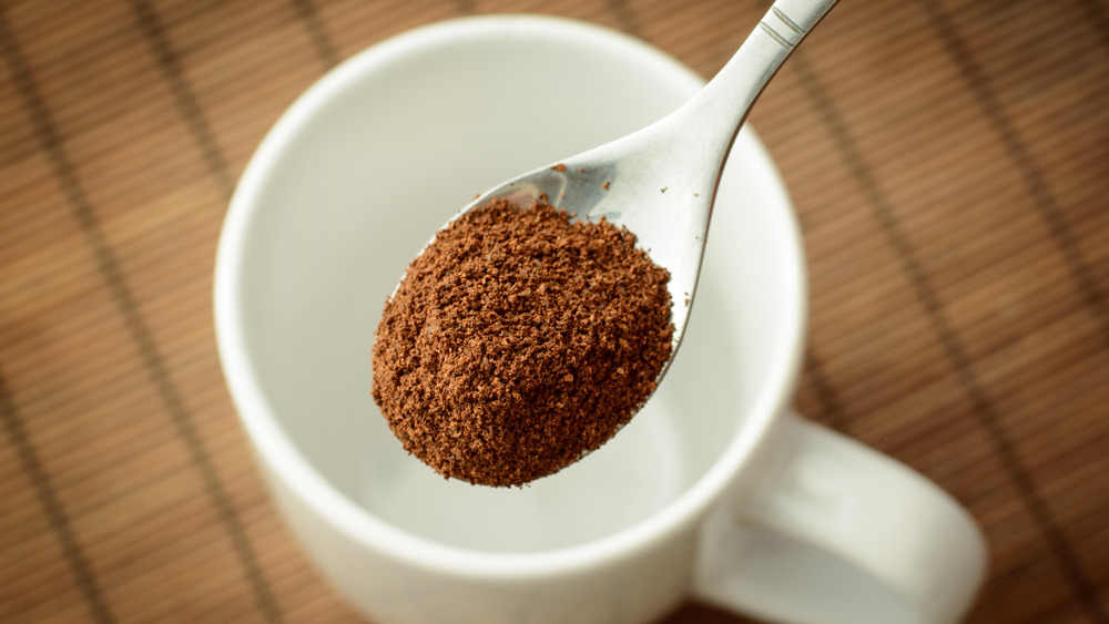 instant coffee pouring out of packet