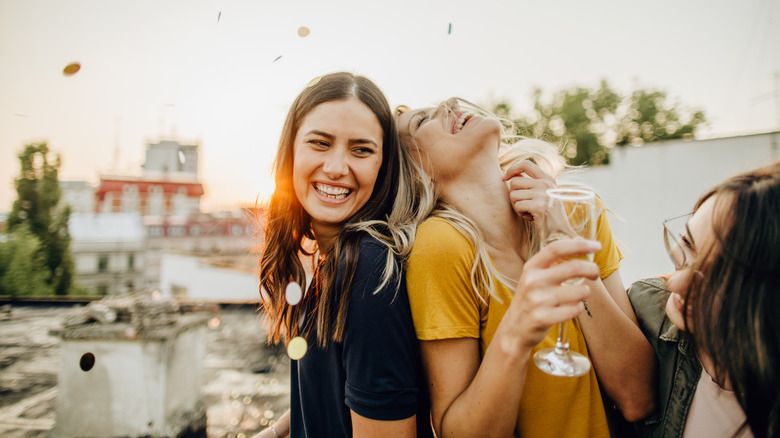 friends drinking together outside