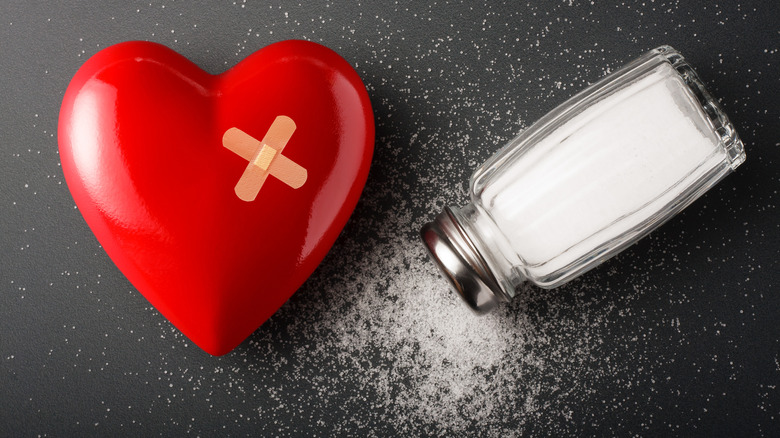 Salt shaker next to heart