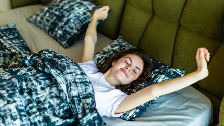 Refreshed teen waking up
