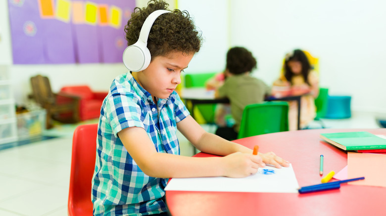 Boy with autism in classroom