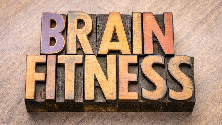 Wooden sign saying 'Brain Fitness'