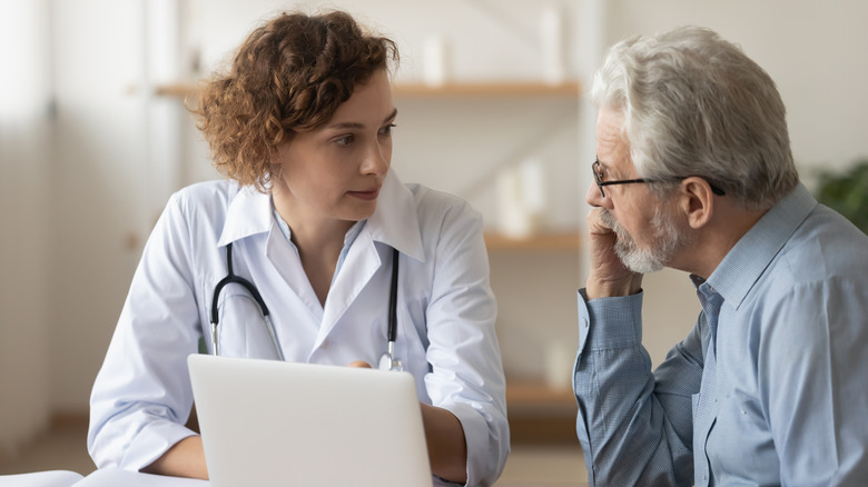 A doctor treats someone with dementia