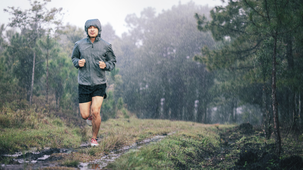 Man running in the rain